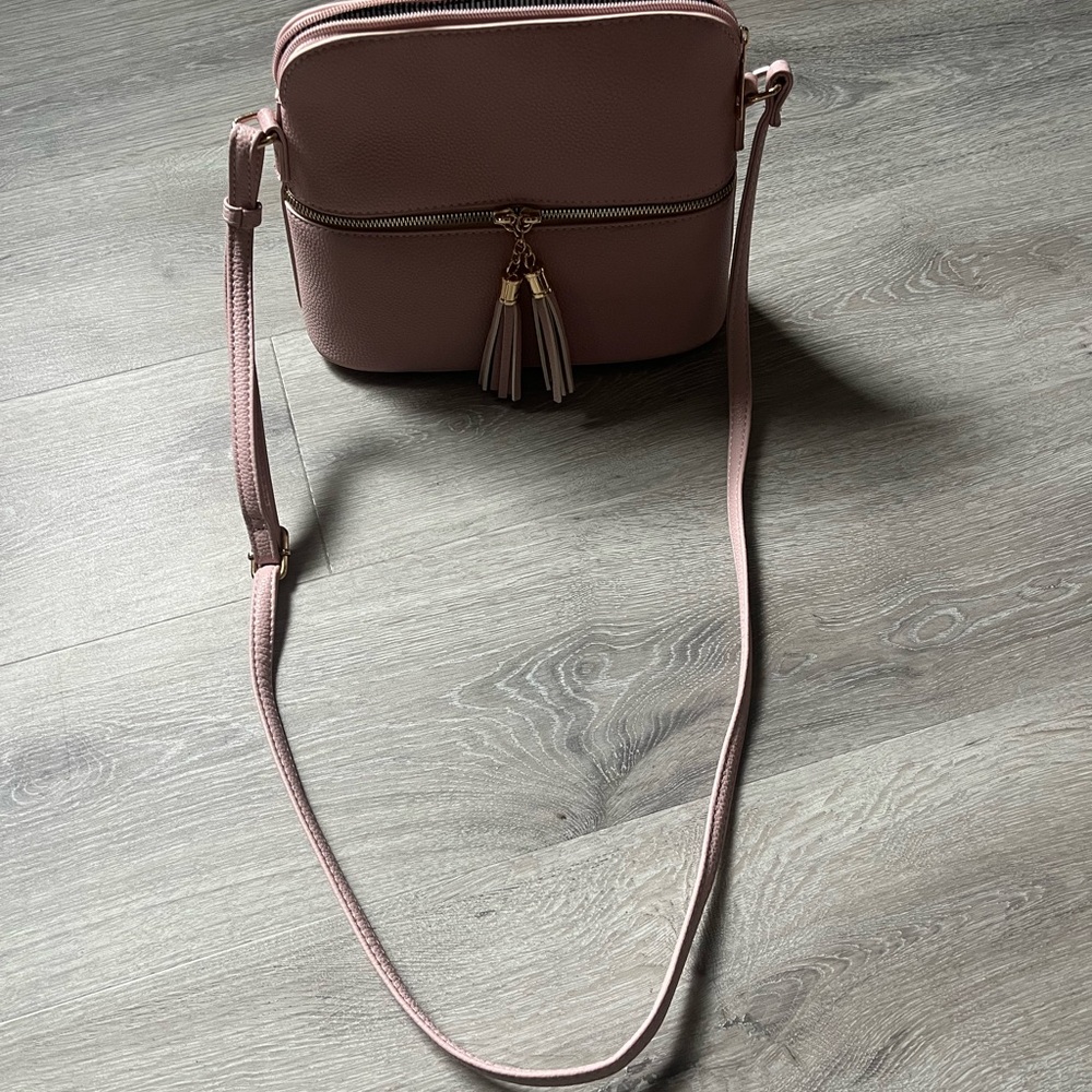 Women's Blush Pink Crossbody Bag with Tassel Accent